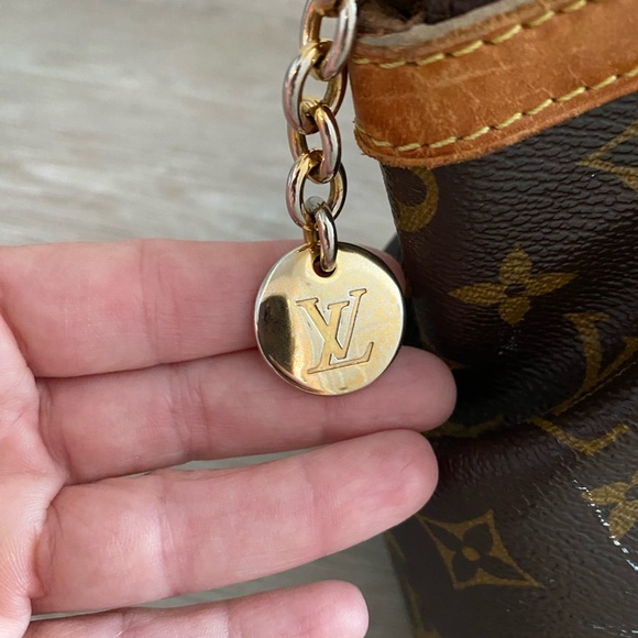 Authentic, Pre-owned Louis Vuitton Tivoli Monogram PM Bag. Great condition. - Picture 4 of 8